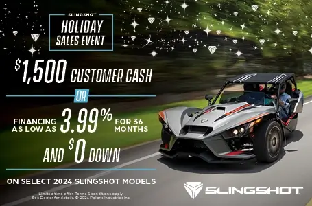 Three slingshots driving down on an open road. Promotional Offer: Holiday Sales Event.  $1,500 customer cash or financing as low as 3.99% for 36 months and $0 down on select 2024 slingshot models.