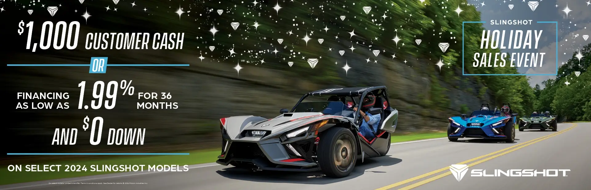 Three slingshots driving down on an open road. Promotional Offer: Holiday Sales Event.  $1,000 customer cash or financing as low as 1.99% for 36 months and $0 down on select 2024 slingshot models.